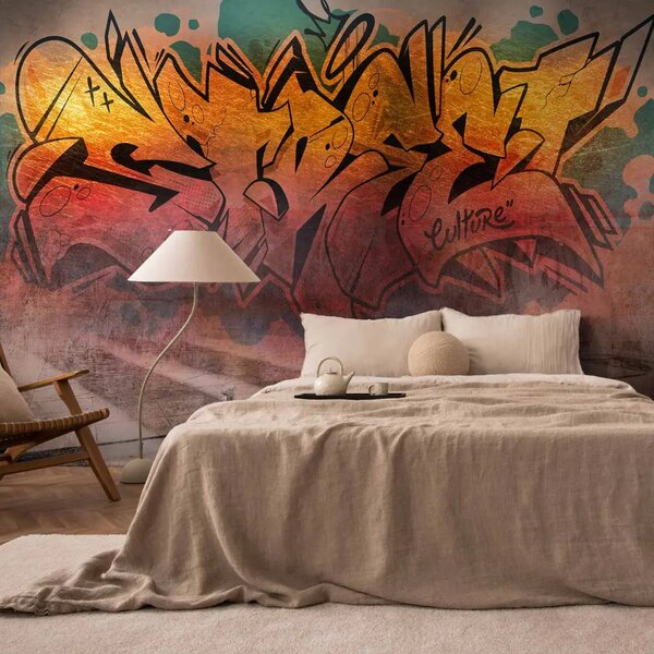 Carta da parati Street art - graffiti urbani con grande scritta nei colori solari