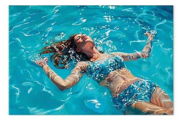 Quadro su tela Spensieratezza alla deriva - donna in costume blu che galleggia