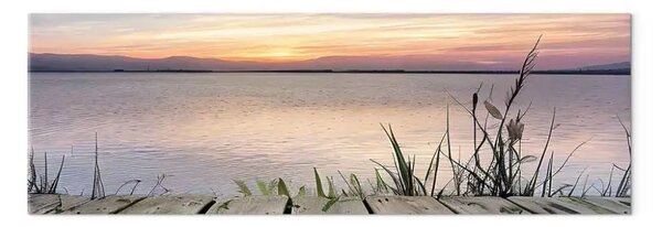 Quadro su tela Lago al tramonto - canneti sullo sfondo di acque calme e montagne