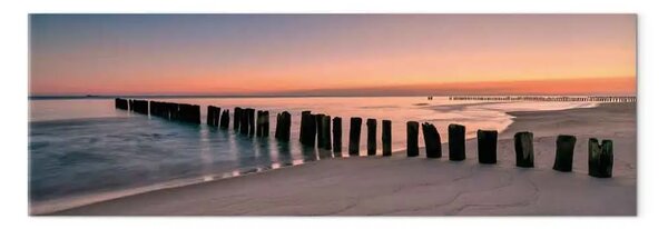 Quadro Frangiflutti - barriere di legno al tramonto sul mare