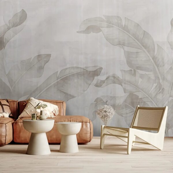Carta da parati moderna Tranquillità tropicale: delicate foglie esotiche su sfondo beige