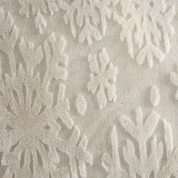 Coperta natalizia decorata con graziosi fiocchi di neve