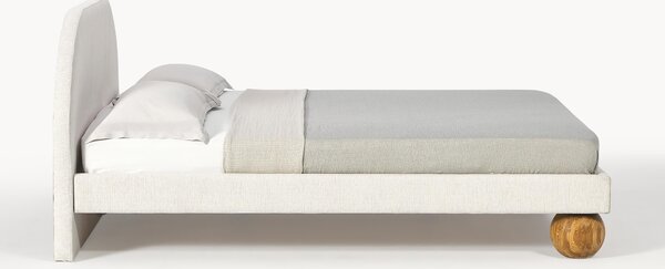 Letto imbottito con piedini rotondi in legno di quercia Rena