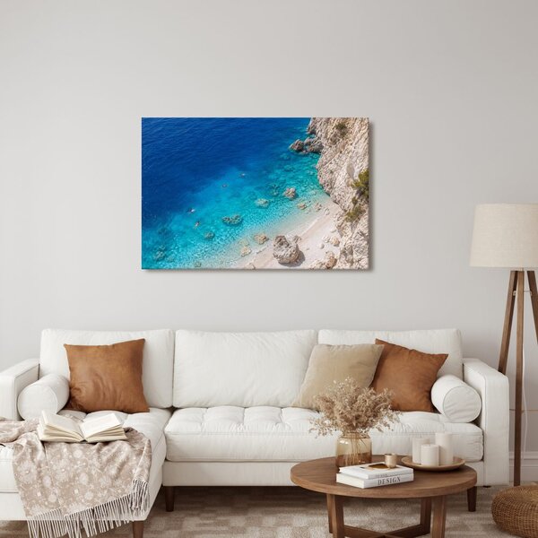 Quadro su tela – Baia turchese sotto le scogliere