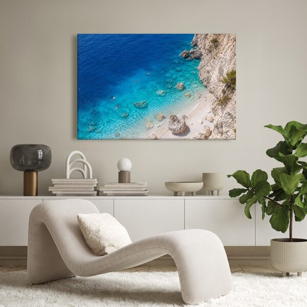 Quadro su tela – Baia turchese sotto le scogliere