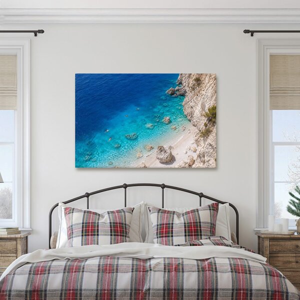 Quadro su tela – Baia turchese sotto le scogliere