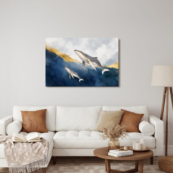 Quadro su tela – Balene tra onde dorate