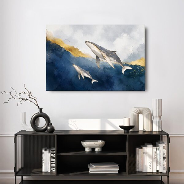 Quadro su tela – Balene tra onde dorate