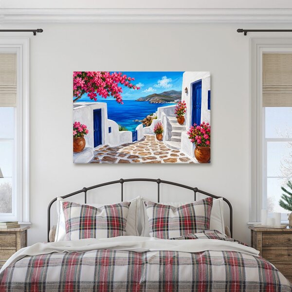 Quadro su tela – Vicolo sul mare con fiori rosa