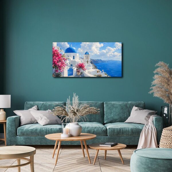 Quadro su tela – Santorini in fiore sotto il cielo estivo