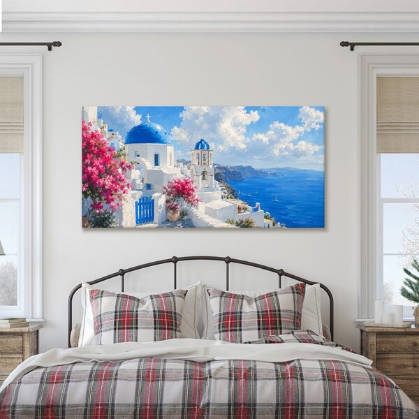 Quadro su tela – Santorini in fiore sotto il cielo estivo