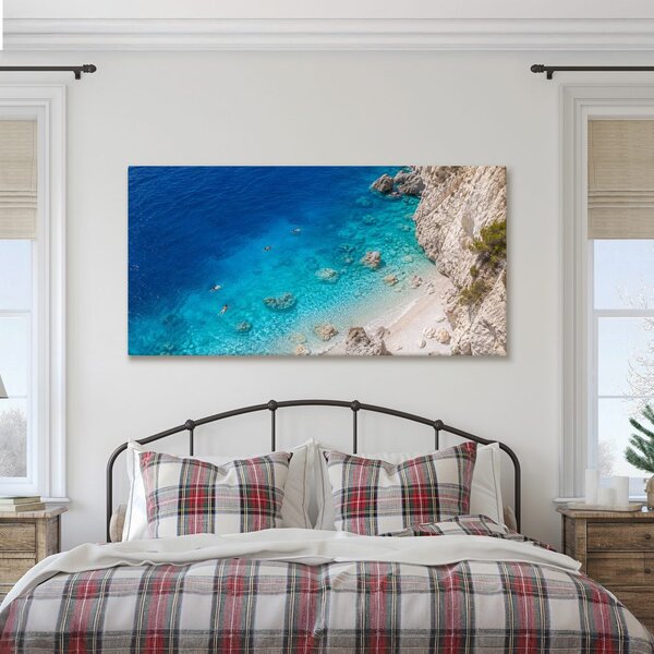 Quadro su tela – Costa rocciosa e mare azzurro