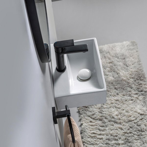 Lavabo Paris, dimensioni 36x25 cm, realizzato in pregiata Vetroceramica, adatto per l'installazione a parete o come lavabo da appoggio, completo di foro per il rubinetto
