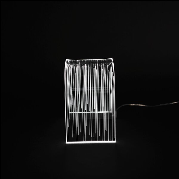 Lampada piccola arc line, dimensioni 15,5x10,5xH17,5 cm, spessore 10 mm alla base luce calda
