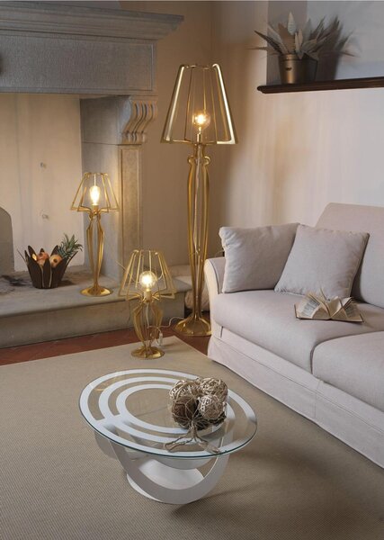 Tavolino da salotto ovale OPTICAL in Metallo tagliato al laser e piano in vetro Dimensioni 80x58xh 32 cm colore Oro trasparente