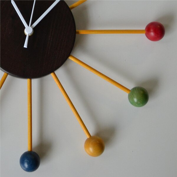 Orologio da parete BALL CLOCK in legno di tiglio 42x42cm ogni raggio uguale ad un Ora Wengh� Multicolor