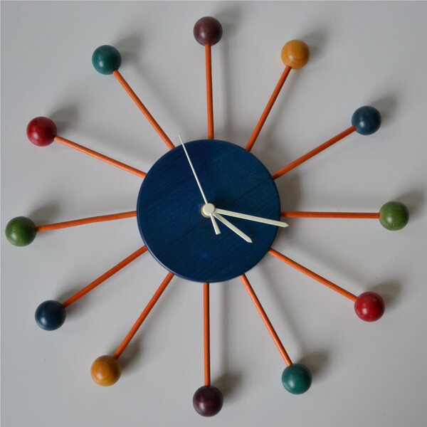 Orologio da parete BALL CLOCK in legno di tiglio 42x42cm ogni raggio uguale ad un Ora Multicolor