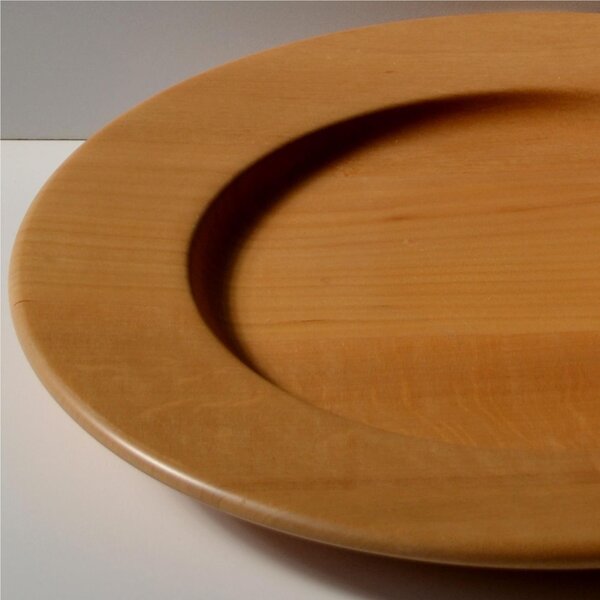 Sottopiatto in legno massello � 32xh 3,2cm con legno massello di tiglio , il piatto � lavorato e tornito singolarmente a mano Naturale