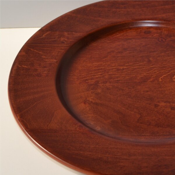 Sottopiatto in legno massello � 32xh 3,2cm con legno massello di tiglio , il piatto � lavorato e tornito singolarmente a mano Mogano
