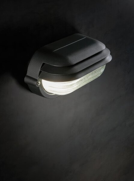 Applique in pressofusione di alluminio PALPEBRA OVALE PICCOLA E27 Dimensioni 21,9x10,4x h 11,5 cm Diffusore in vetro stampato colore NERO