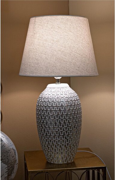 Lampada da tavolo in resina con eleganti decorazioni geometriche in rilievo Dimensioni 35xh 65 cm in resina e paralume in tessuto bianco