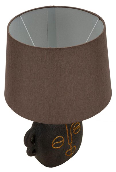 Lampada da tavolo in resina dalla forma ispirata ad un volto tribale Dimensioni 30,5xh 46 cm in resina e paralume in tessuto grigio