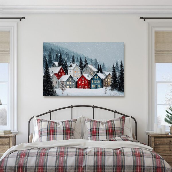 Quadro su tela – Villaggio natalizio sotto la neve