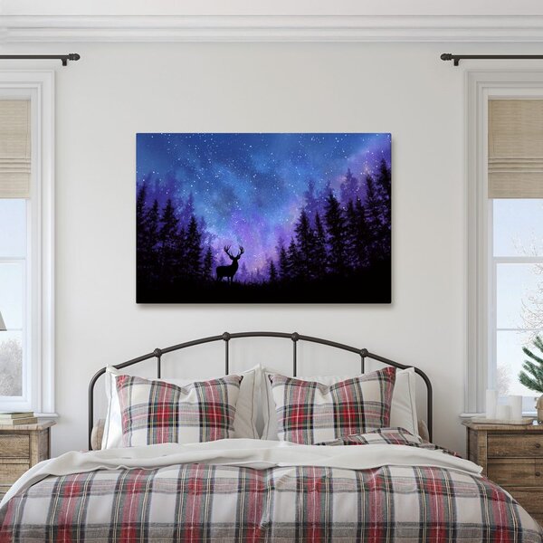 Quadro su tela – Cervo natalizio nella foresta magica