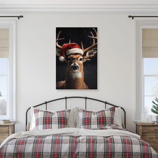 Quadro su tela – Dolce renna con cappello di Natale