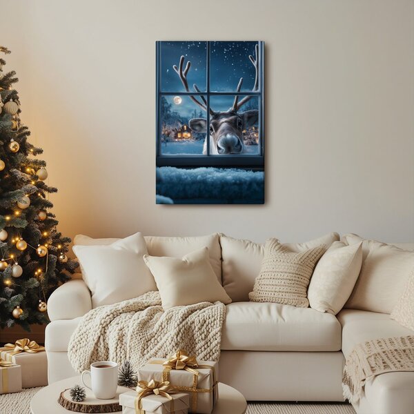 Quadro su tela Natalizio – Renna carina dietro finestra innevata