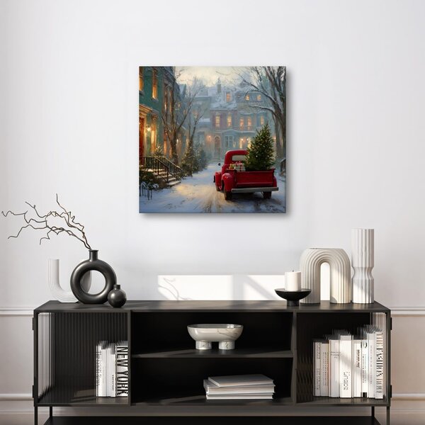 Quadro su tela – Atmosfera natalizia in strada innevata