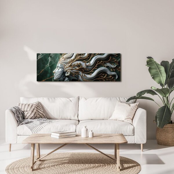 Quadro su tela – Donna unita alla natura con foglie dorate
