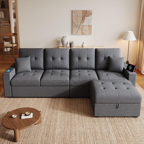 Divano angolare a forma di L, dimensioni 253x144,5x80,7 cm, con poggiapiedi posizionabile liberamente, spazio contenitivo, porte USB e Type-C, e illuminazione LED d'ambiente