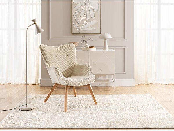 Poltrona con poggiapiedi beige con rivestimento in velluto a coste Niko – Ropez