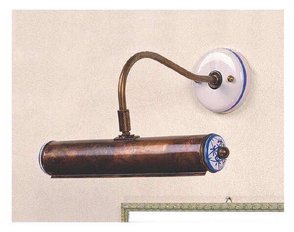 APPLIQUE RUSTICA SOPRA SPECCHIO O QUADRO IN OTTONE INVECCHIATO CON PARTICOLARI IN CERAMICA