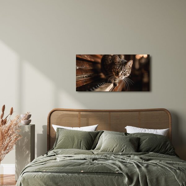 Quadro su tela – Gatto curioso sul pianoforte