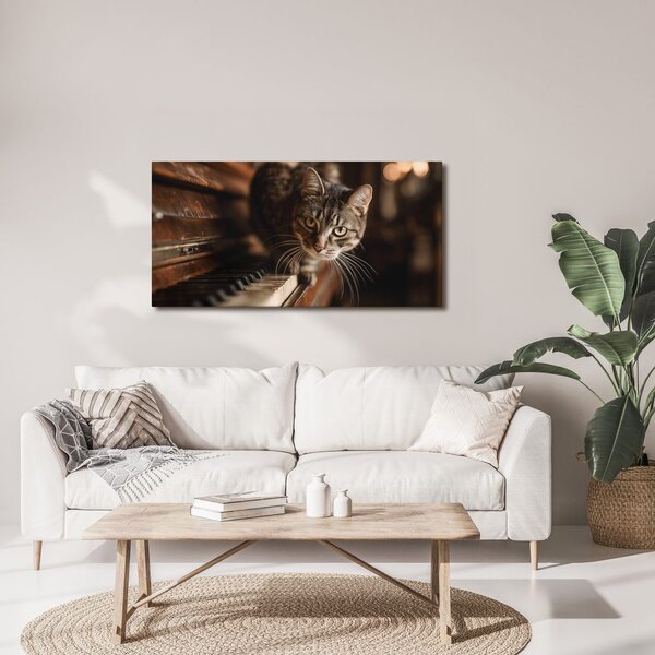 Quadro su tela – Gatto curioso sul pianoforte