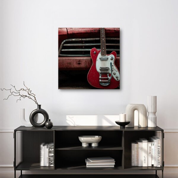 Quadro su tela – Chitarra rossa davanti all'auto