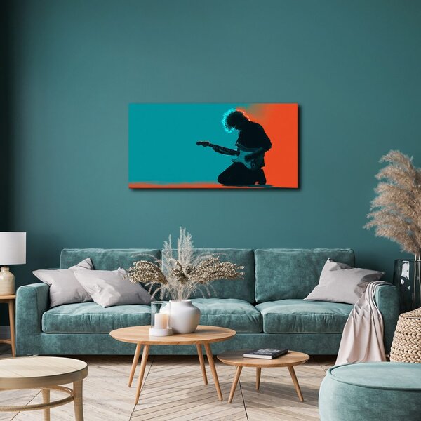 Quadro su tela – Chitarrista in luce colorata
