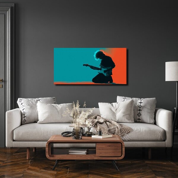 Quadro su tela – Chitarrista in luce colorata