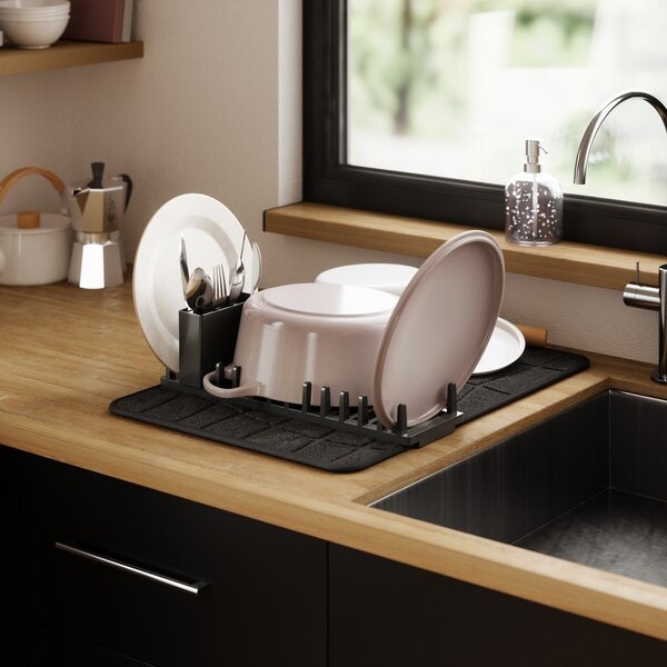 Tappetino scolapiatti nero opaco in plastica 61x43 cm Udry – Umbra