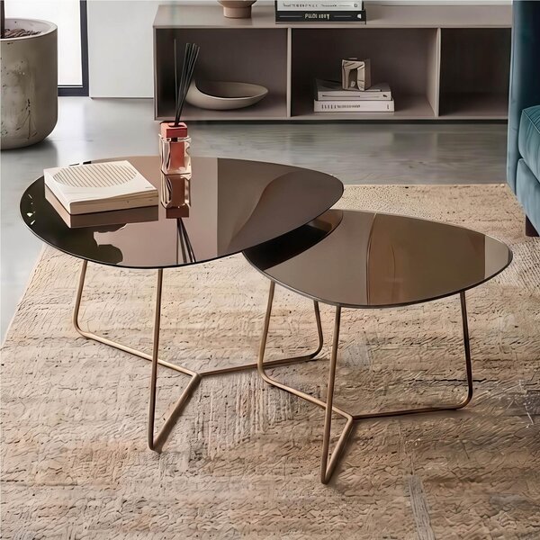 Coppia Tavolinetti da salotto forma ovoidale BIG e SMALL MOD.STONE dimensioni 66x72x 49 h cm - 54x48x 44 h cm design moderno colore Ottone A Specchio Brunito, gamba in tinta bronzo metallizzato