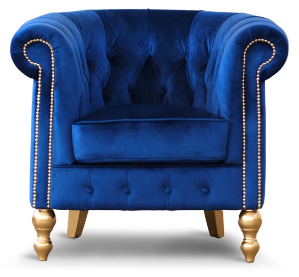 Poltrona Chesterina in velluto blu con gambe e borchie oro