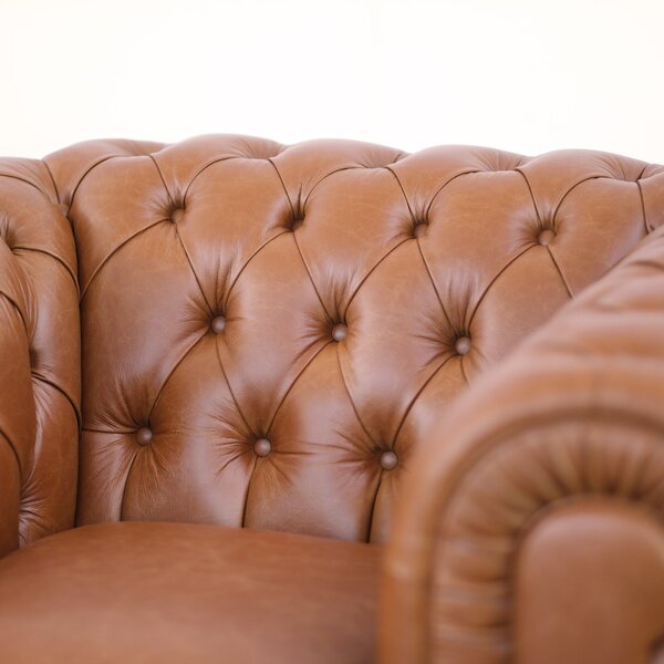 Poltrona Chester pelle fiore cognac