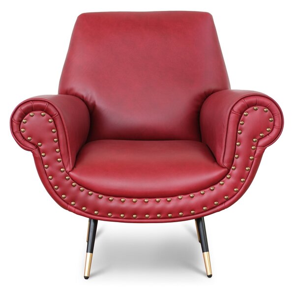 Poltrona design vintage Vico pelle fiore pull up rosso ciliegia con borchie anticate e gambe nere e ottone