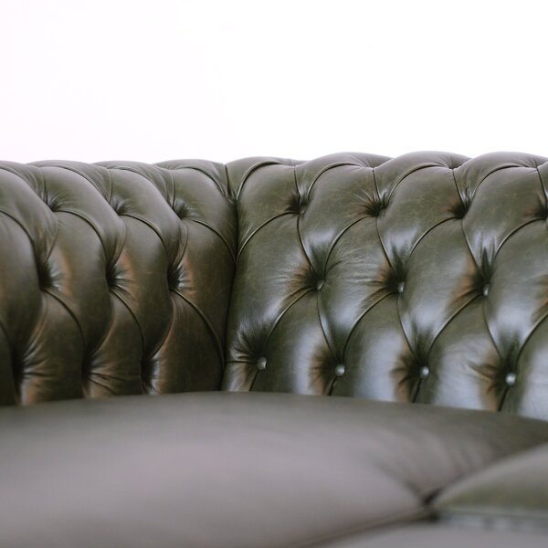 Divano Chesterfield angolare in pelle primo fiore verde inglese borchie anticate