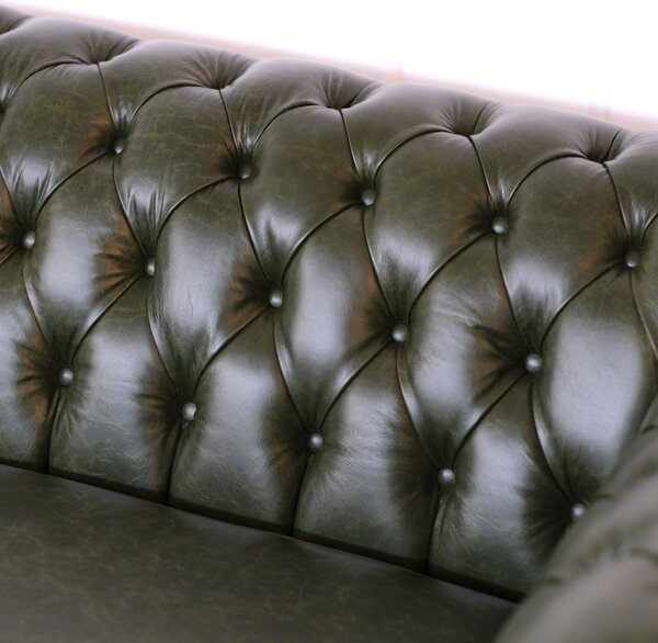 Divano Chesterfield angolare in pelle primo fiore verde inglese borchie anticate