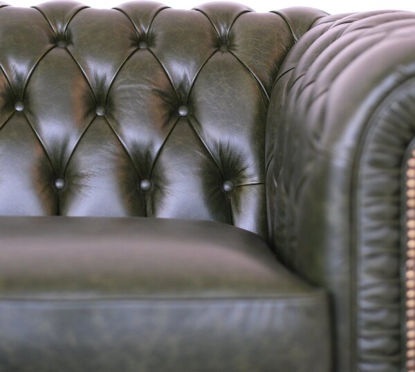 Divano Chesterfield angolare in pelle primo fiore verde inglese borchie anticate