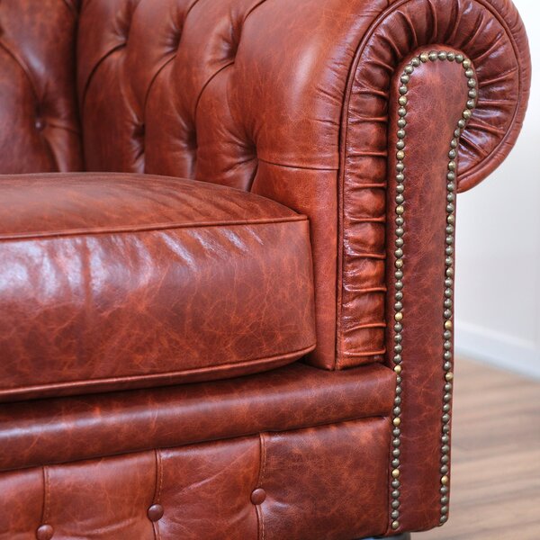 Divano Chesterfield pelle fiore color brandy old England con borchie anticate