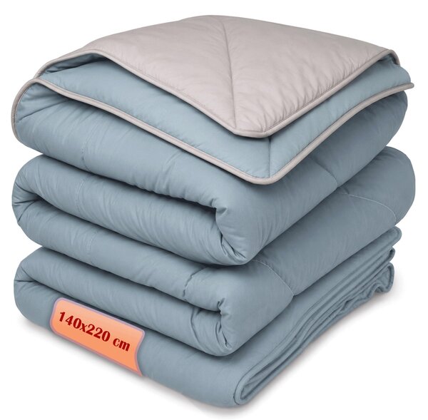 Coperta trapuntata, confortevole e reversibile